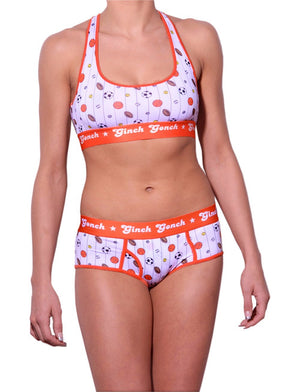 GG Ginch Gonch Hardball sports bra - women's Underwear - pin striped white fabric with basketballs, footballs, soccer balls, tennis balls, and baseballs. Orange trim with orange printed band front shown with matching briefs