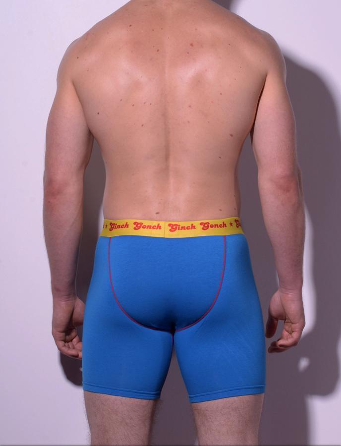 Ginch Gonch GG Ginchcredible super hero men's underwear boxer brief trunk y front blue fabric with GG logo, red trim, and yellow printed waistband back